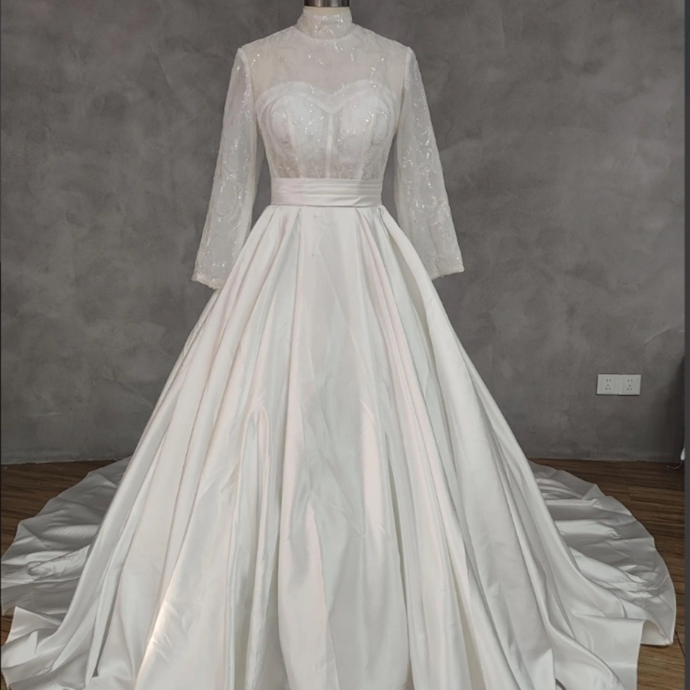 Wedding dress high neck long sleeves and long train with waist band and beading